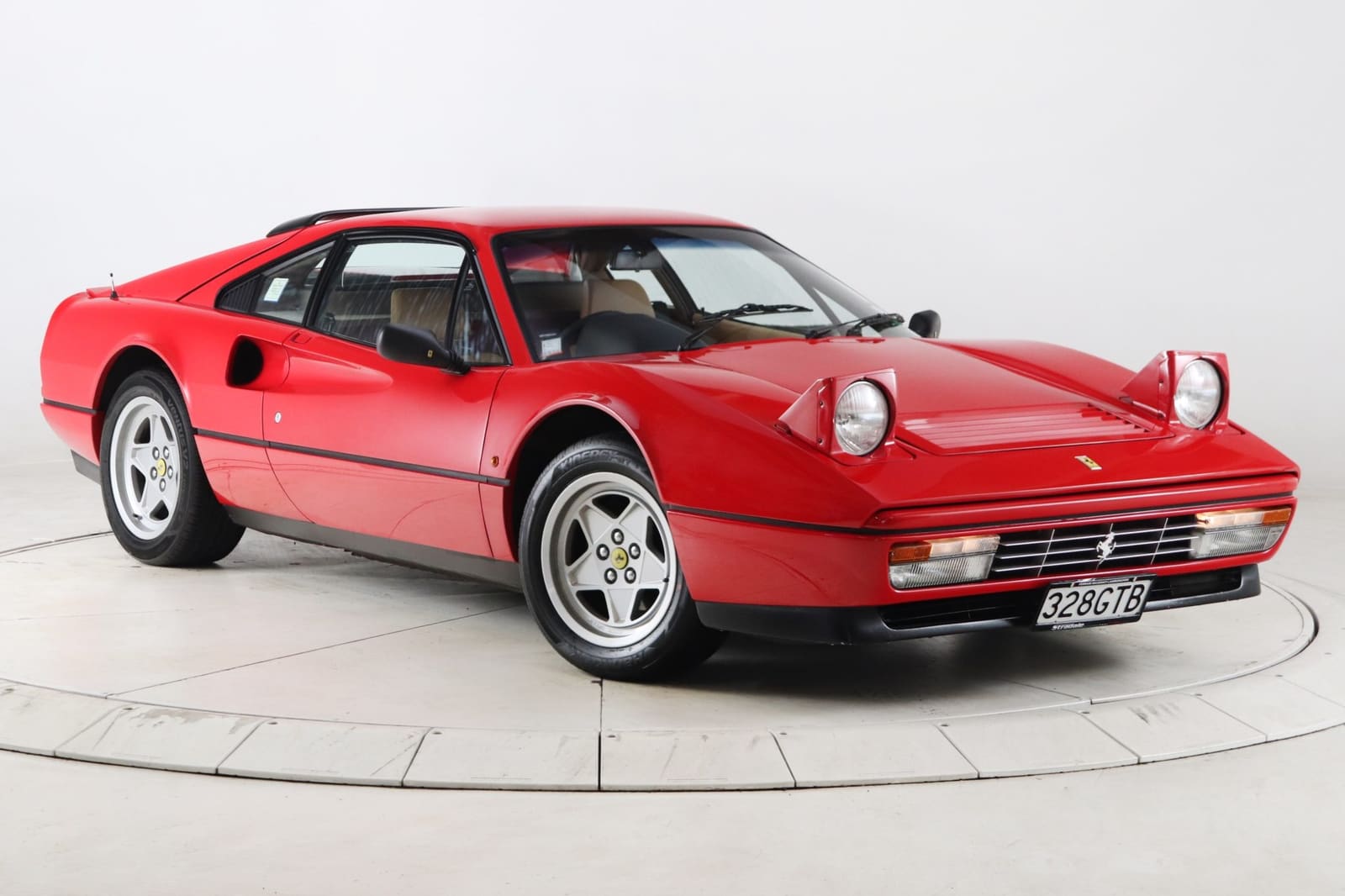 Ferrari 328 GTB in Rosso — a European classic bound for the USA