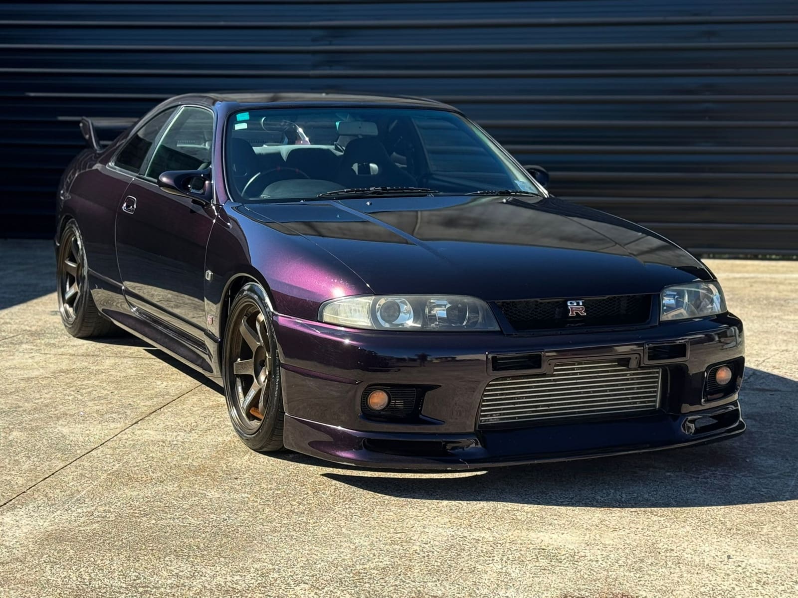 Midnight Purple R33 GT-R at the Importify yard in New Zealand